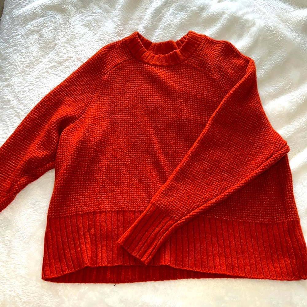 Orange knit sweater